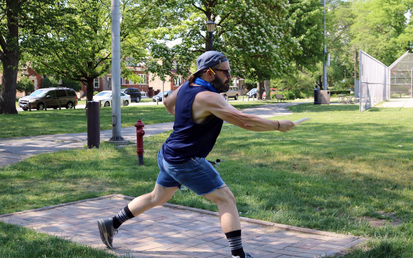 Photo of a man playing disc golf at the Berwyn Park District for the Active Adults Programs