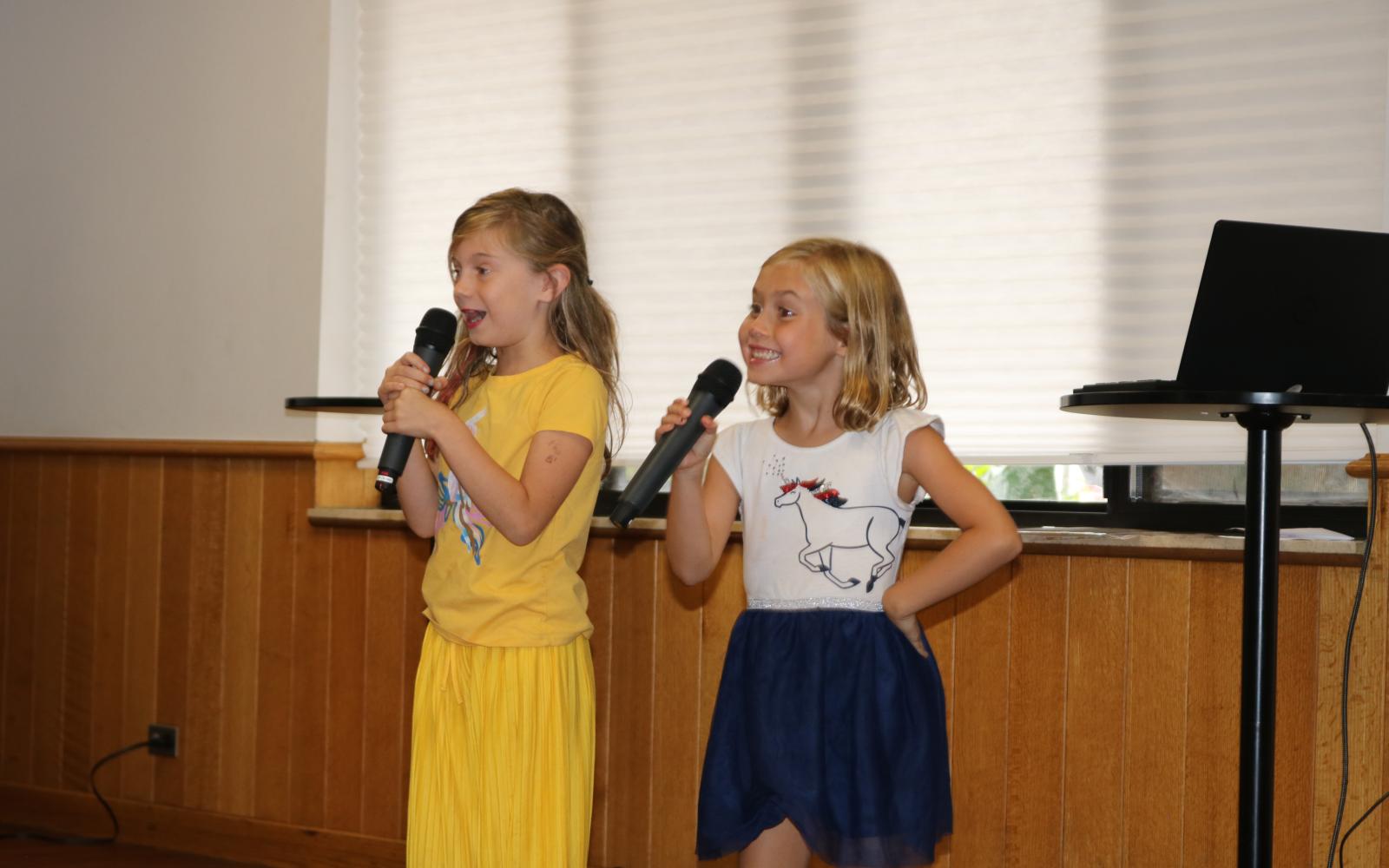 Berwyn Park District campers telling jokes at the talent show